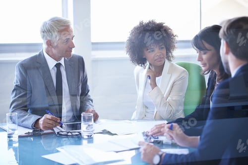 Preview: Business discussions. Cropped shot of a group of business colleagues meeting in the boardroom.