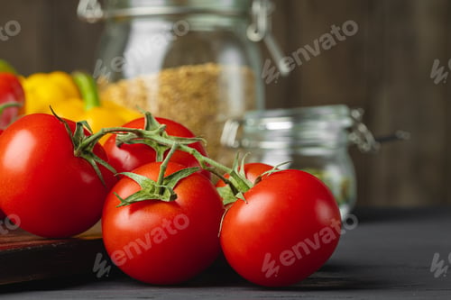 Preview: Close up of cherry tomatoes on kitchen table