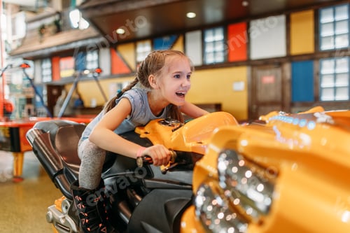 Preview: Girl plays game machine, entertainment center