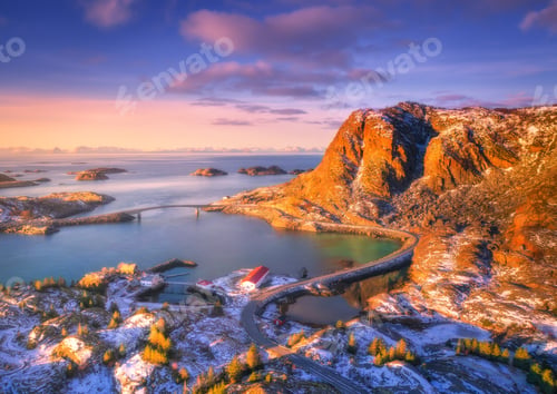 Preview: Aerial view of beautiful mountains, bridge, small islands in the sea, road, purple sky at sunset. Lo