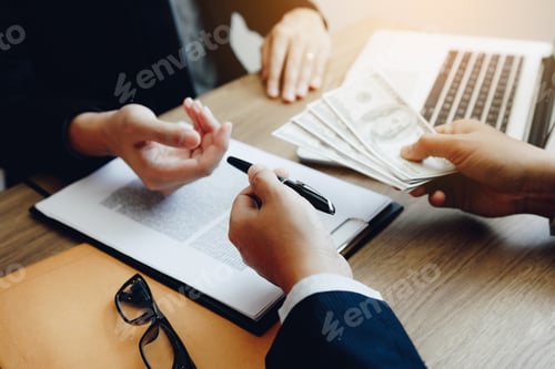 Preview: Business Deal with Signature and Money Exchanged