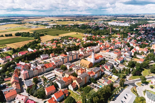 Preview: Aerial view of small european town with residential buildings and streets