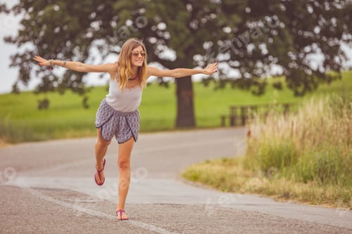 Preview: Girl Enjoying On A Empty Suburb Road.