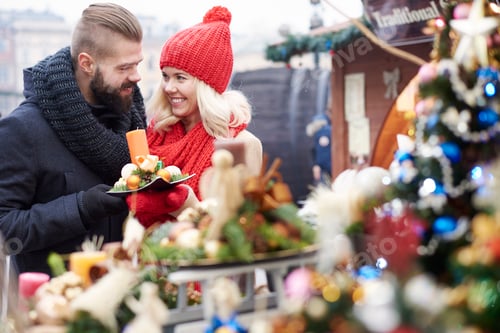 Browsing some christmas ornaments on christmas market