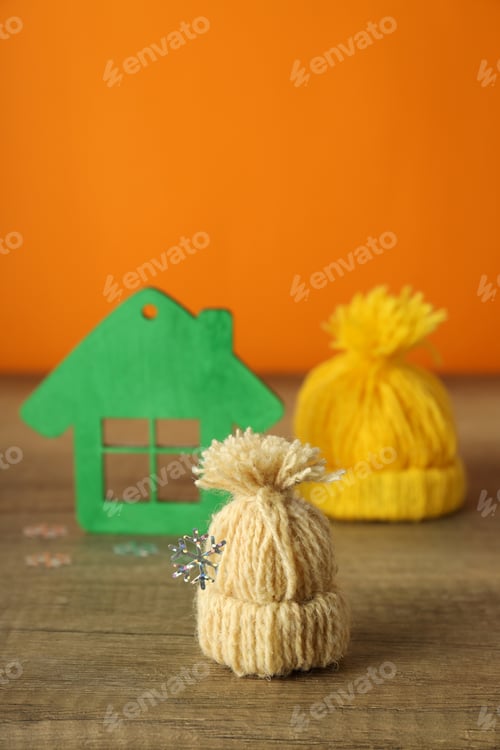 Preview: Concept of heating season against orange background