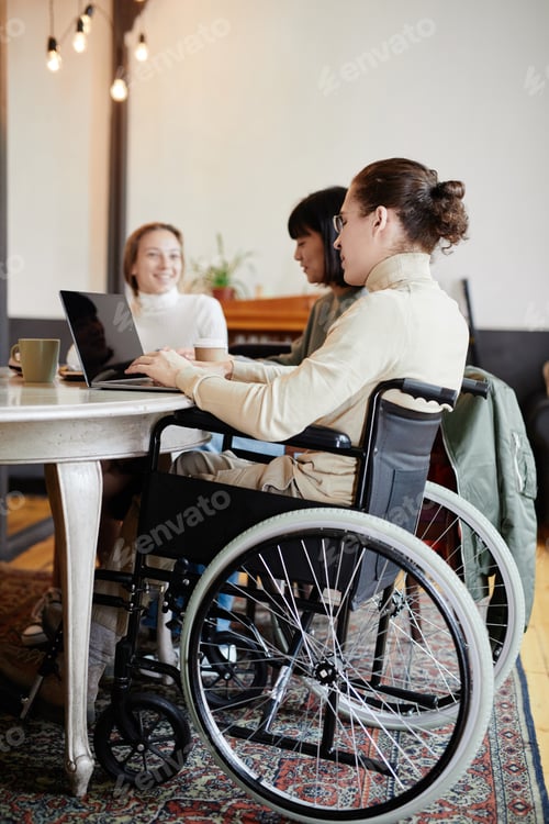 Preview: Student with disability studying on laptop
