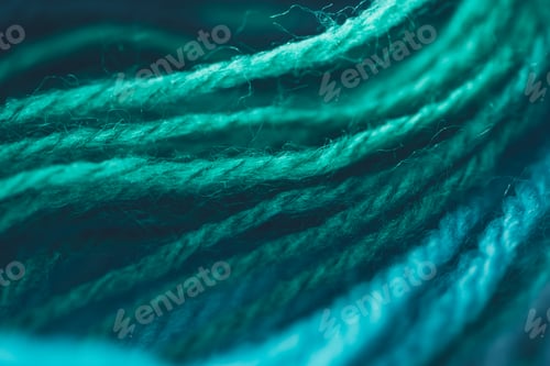 Preview: close up view of blue and green knitting yarn ball
