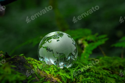 Preview: Crystal globe placed on moss ESG concept for environment Society and Governance Sustainable global
