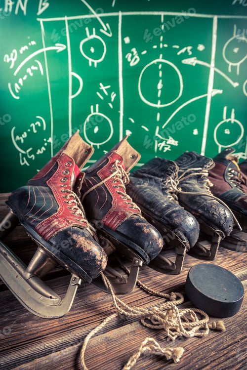 Preview: Plan to playing in hockey matches on old wooden table