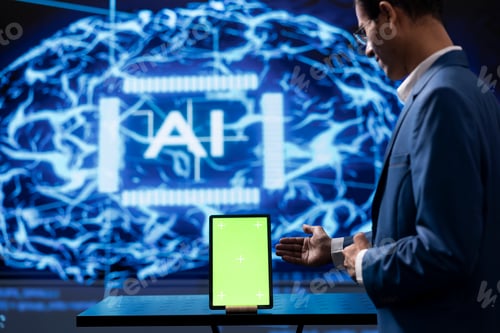 Preview: Startup employee looking over green screen tablet, using AI software