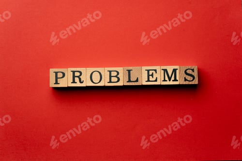 Preview: a yellow warm background without shadows wooden cubes with black letters laid out word problems