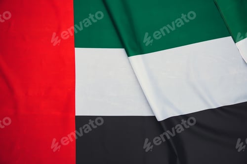 Preview: United Arab Emirates flag blowing in the wind. Background texture.