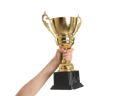 Preview: Woman holding gold trophy cup on white background, closeup