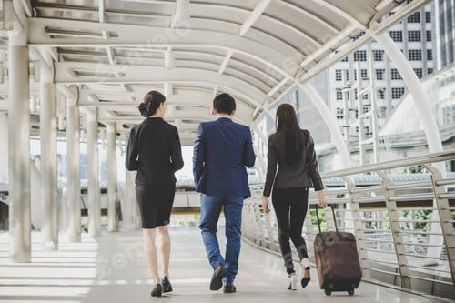 Preview: Business man and woman are going on business trip.