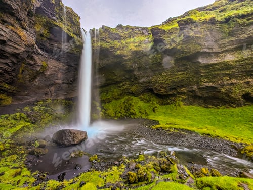 Preview: Iceland's Kvernufoss cascades, long-exposure shot.