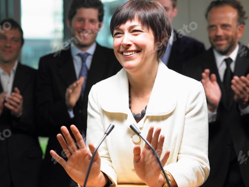 Preview: Business woman giving a conference