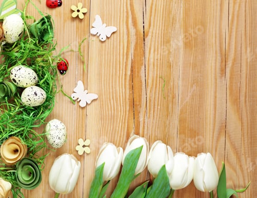 Preview: Easter composition with eggs and flowers on a wooden background