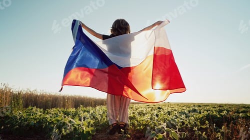 Preview: Czech little kid - patriot child boy jumps with national flag on nature background at summer