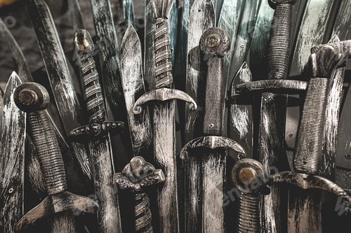 Preview: Metal knight swords background. Close up. The concept Knights.