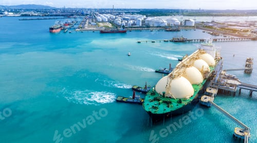 Preview: LNG (Liquefied natural gas) tanker anchored in Gas terminal gas tanks for storage. Oil Crude Gas