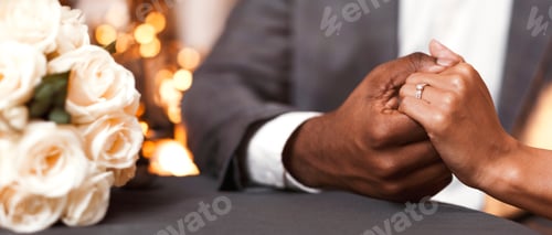 Preview: Cropped image of black couple in restaurant