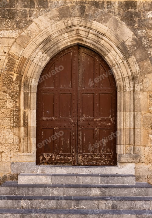 Preview: Medieval Entrance Door on the Exterior of Old Brick Wall.