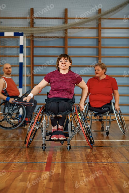 Preview: People in wheelchair playing tennis on court. Wheel Chair Tennis For Disabled.