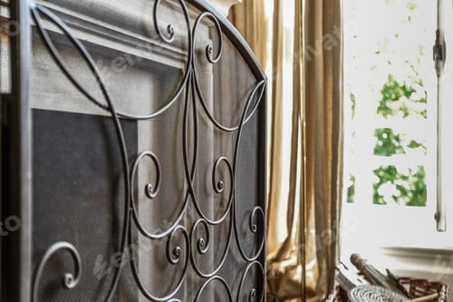 Preview: Ornamental iron fireplace screen in living room