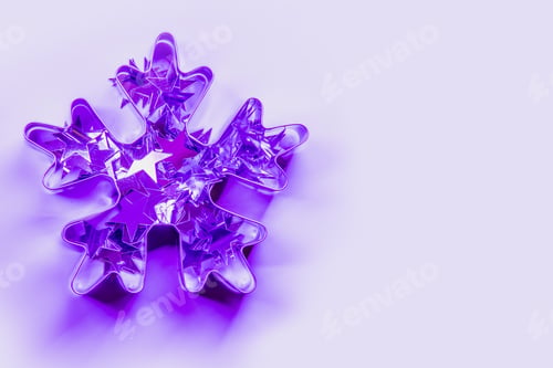 Preview: Christmas cutter as snowflake on neon pink and blue rays. Creative Xmas pattern.
