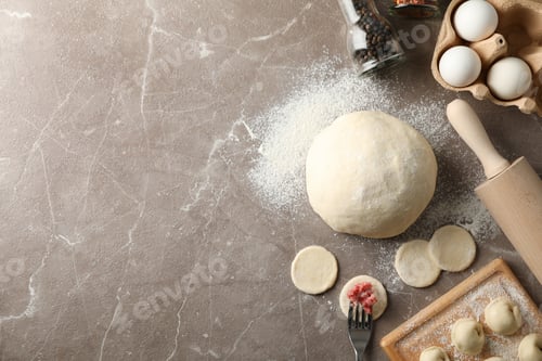 Preview: Composition with spices, minced meat and dumplings on grey background, top view