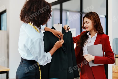 Preview: Stylish Women Fashion Designers Working in Studio