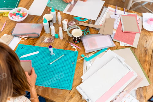 Preview: Scrapbook workshop. Work table. Tools, cardboard and papers for the workshop