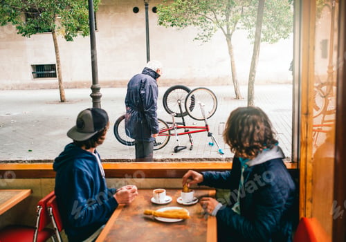 Preview: Older man observes the boys' bicycles.