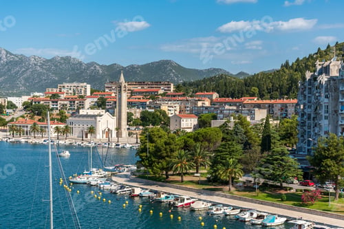 Preview: Picturesque view of coastal town featuring several boats docked in the water. Ploče, Croatia
