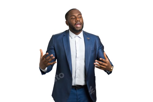 Preview: Man in a Suit Gesturing on White Background