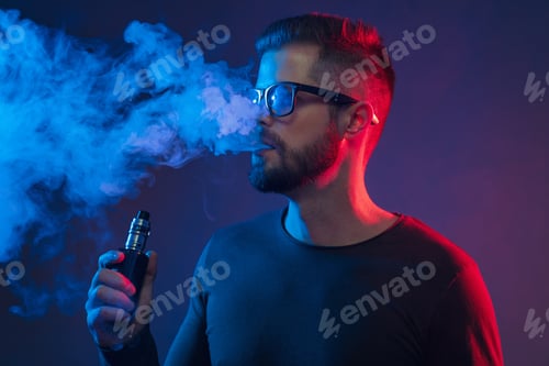 Preview: Vaping flavored e-liquid from an electronic cigarette