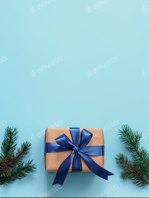 Preview: Gift with Blue Ribbon and Green Sprigs
