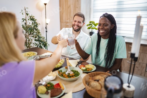 Preview: Friends gather for a joyful dinner celebration at home