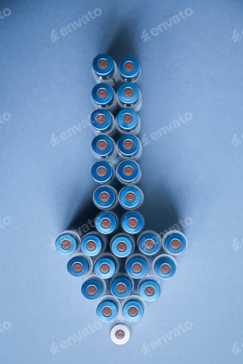 Preview: Vaccine bottles on a blue background forming an arrow.