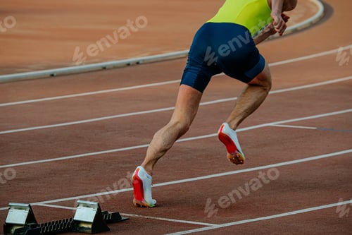 Preview: athlete running from start of sprint race