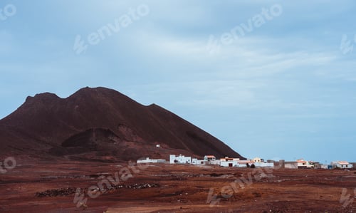 Preview: Local village Calhau at the foot of the volcanic crater. Single martian like dry red rock stand out
