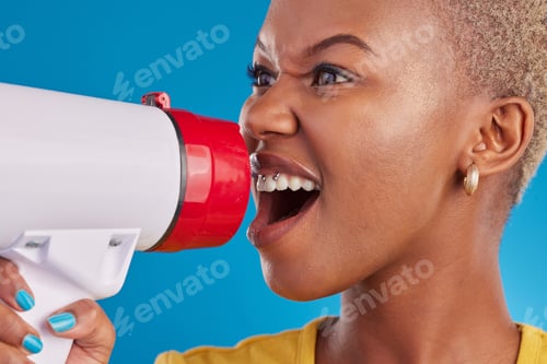 Preview: Megaphone, shouting and face of black woman in studio for message, broadcast or vote on blue backgr