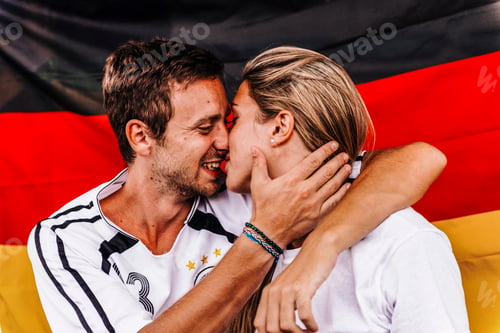 Preview: Supporters from Germany kissing at Stadium