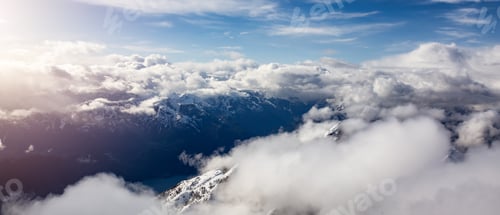 Preview: Canadian Coastal Mountain Landscape covered in Clouds. Aerial Panorama