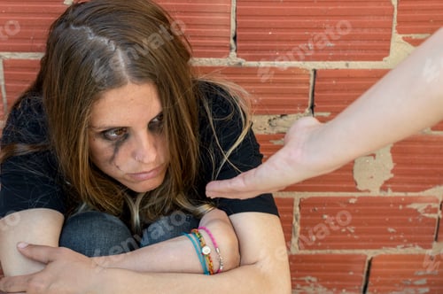 Preview: offering hand to depressed young woman