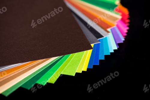 Preview: various colorful papers isolated on black