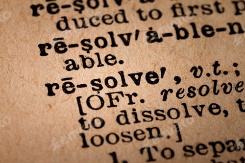 Preview: Close-up of an Opened Dictionary showing the Word RESOLVE