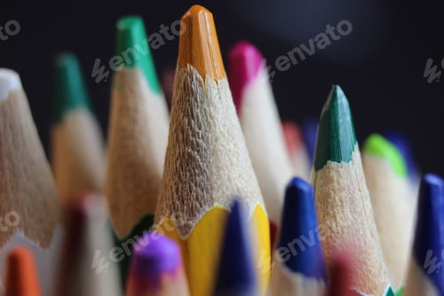 Preview: Closeup of multicolor pencils on black background