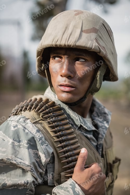 Preview: Military soldier during training exercise with weapon