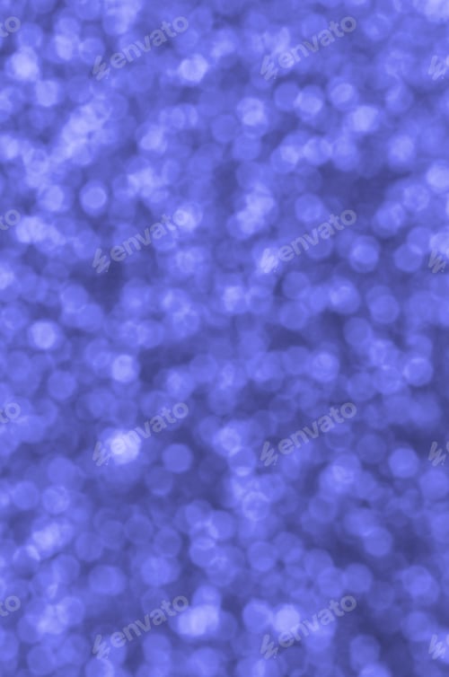 Preview: Blurred blue decorative sequins. Background image with shiny bokeh lights from small elements